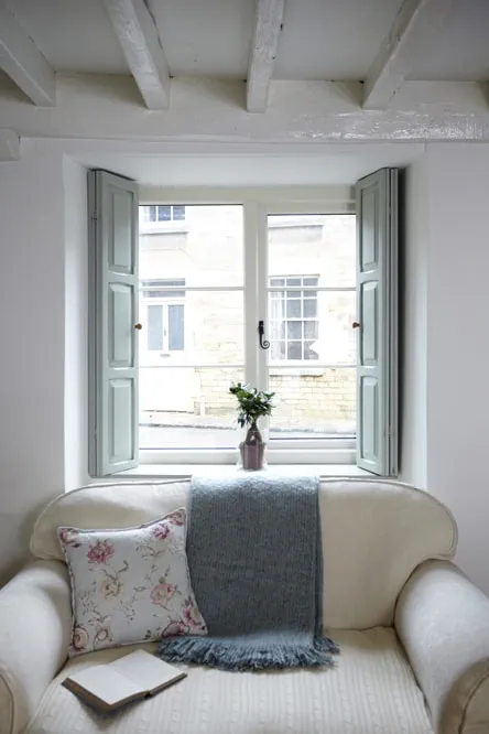 White timber casement living room window with Georgian bars from the Anglian casement window range