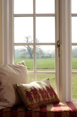 Double glazed timber casement windows in cottage style finished in White from Anglian Home Improvements