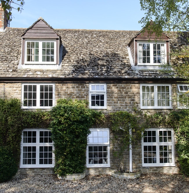 Traditional style property featuring timber windows