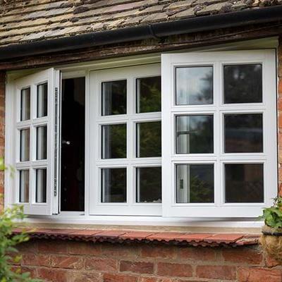 White wooden flush window with cottage bars