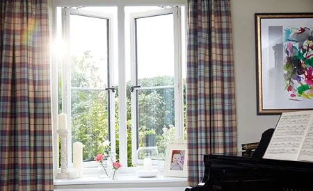 Music room featuring traditional timber window with cottage bar glazing effect