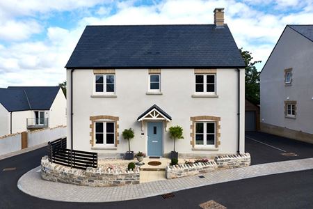 Whole house renovation of replacement flush uPVC casement windows finished in Cream from the Anglian flush window range