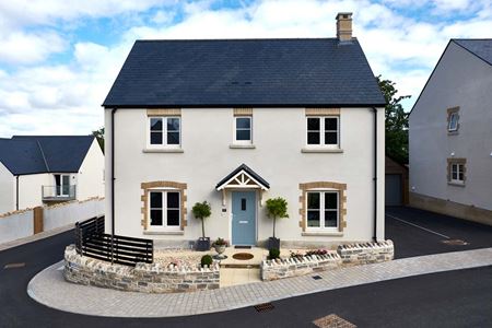 Whole house renovation of replacement flush uPVC casement windows finished in Cream from the Anglian flush window range