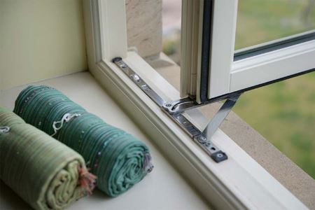 Close up of wooden flush casement window hinge from the Anglian wooden window range