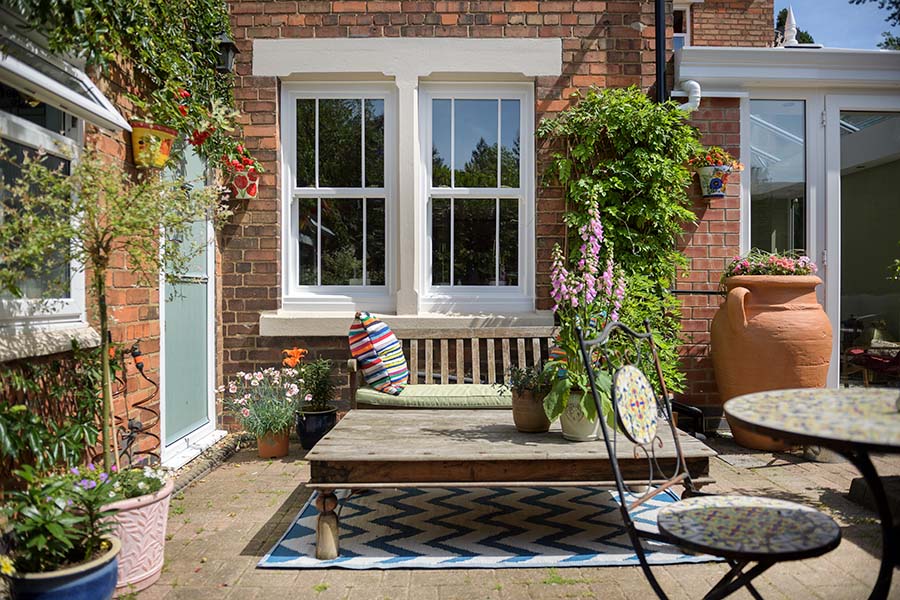 White woodgrain uPVC sliding sash window