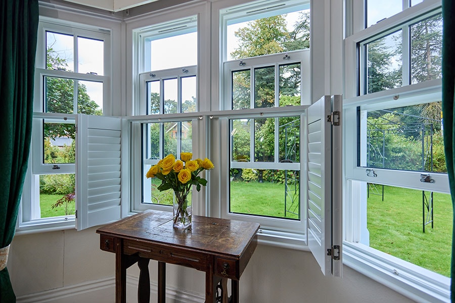 White timber sliding sash spiral balance windows