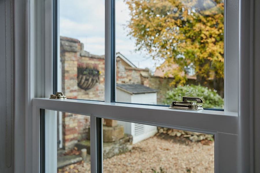 White wooden sliding sash window close up