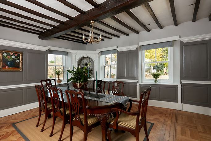 White wooden sliding sash windows in family interior