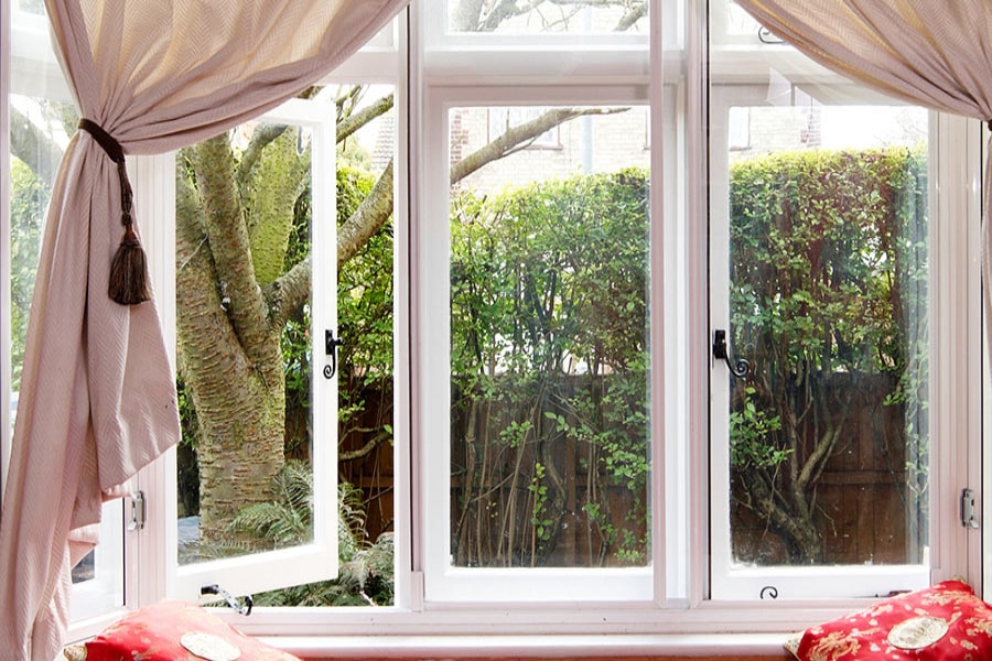 White secondary glazing on living room window from the Anglian secondary glazing range
