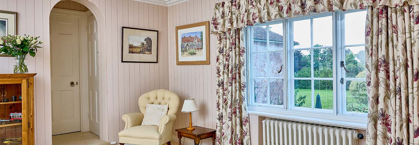 White caseent window with Georgian bar inserts secondary glazing banner