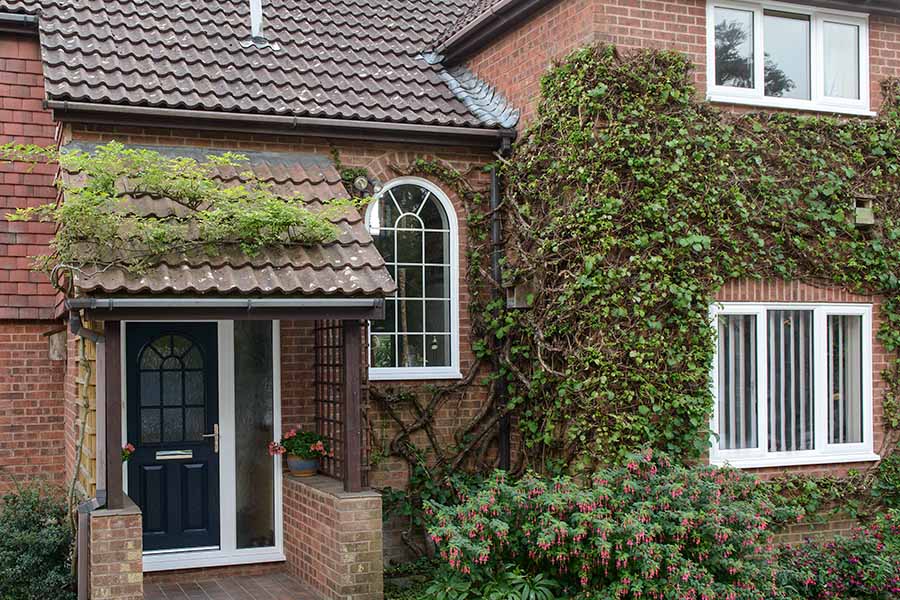 Shaped window at front of house