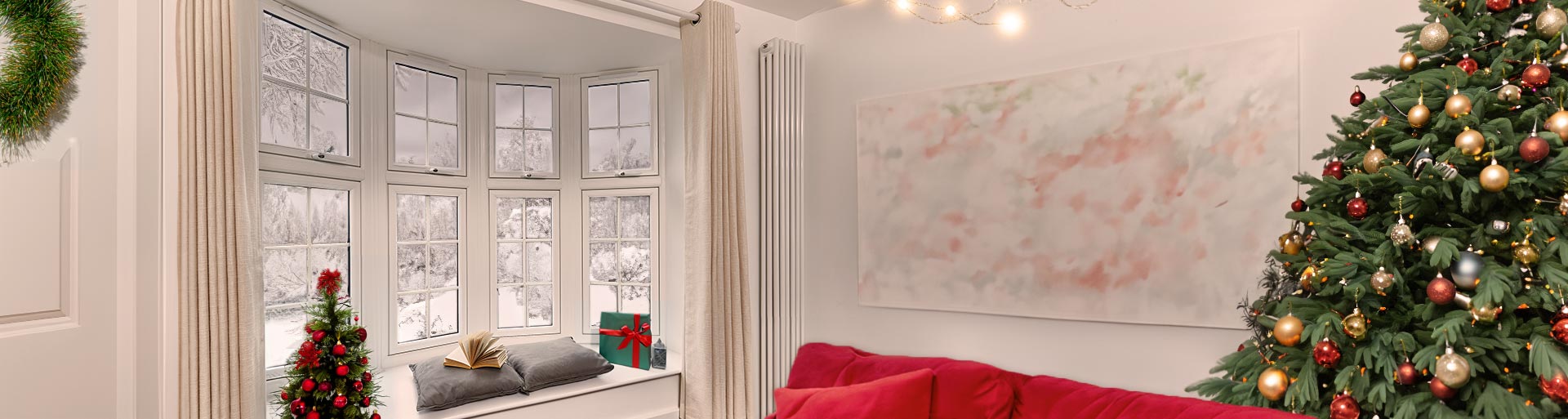 Windows banner with a snowy scene outside and a decorated Christmas tree