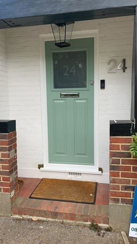 Carlisle composite front door in sage green