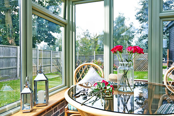 Interior view of conservatory in Sage Green from Anglian Home Improvements