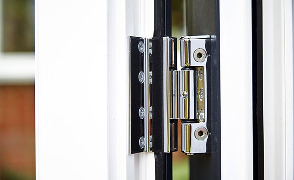 Close up of chrome door hinge from Anglian Home Improvements