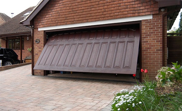 Dark Woodgrain GRP one piece garage door