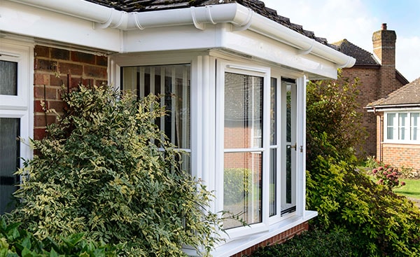 Bungalow with replacement White uPVC bay window from Anglian Home Improvements