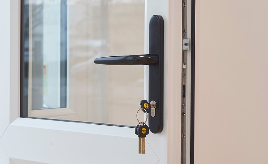 How do you use cylinder replacement to make front and back door keys match?